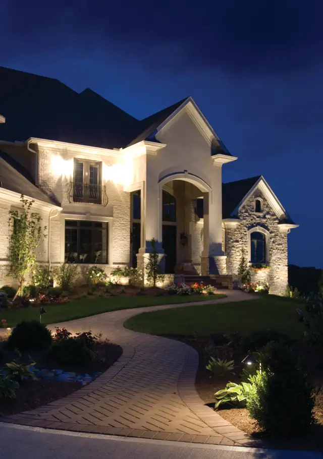 Homearama show home lit with permanent exterior lighting