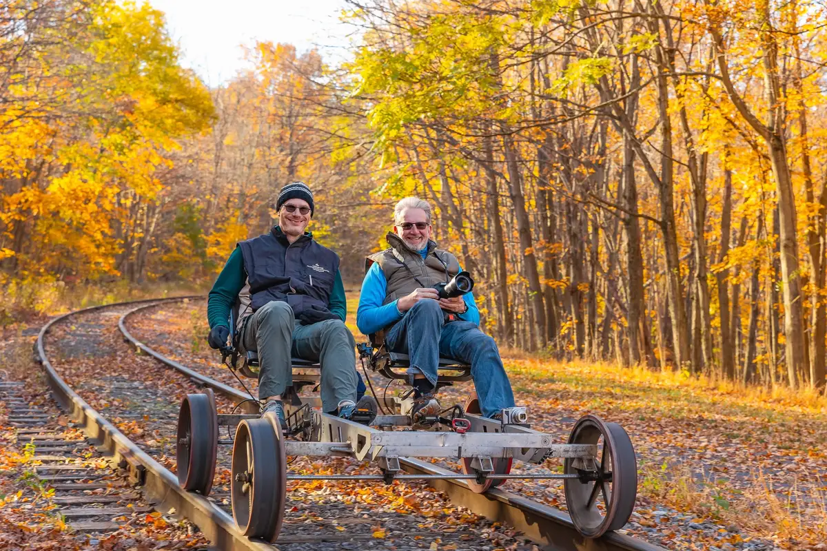 Railbike track running through fall foliage